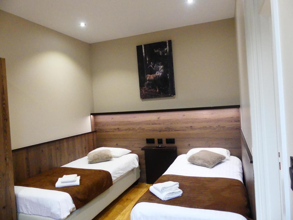 Logis Hotel Des Bains Жерарме Екстер'єр фото